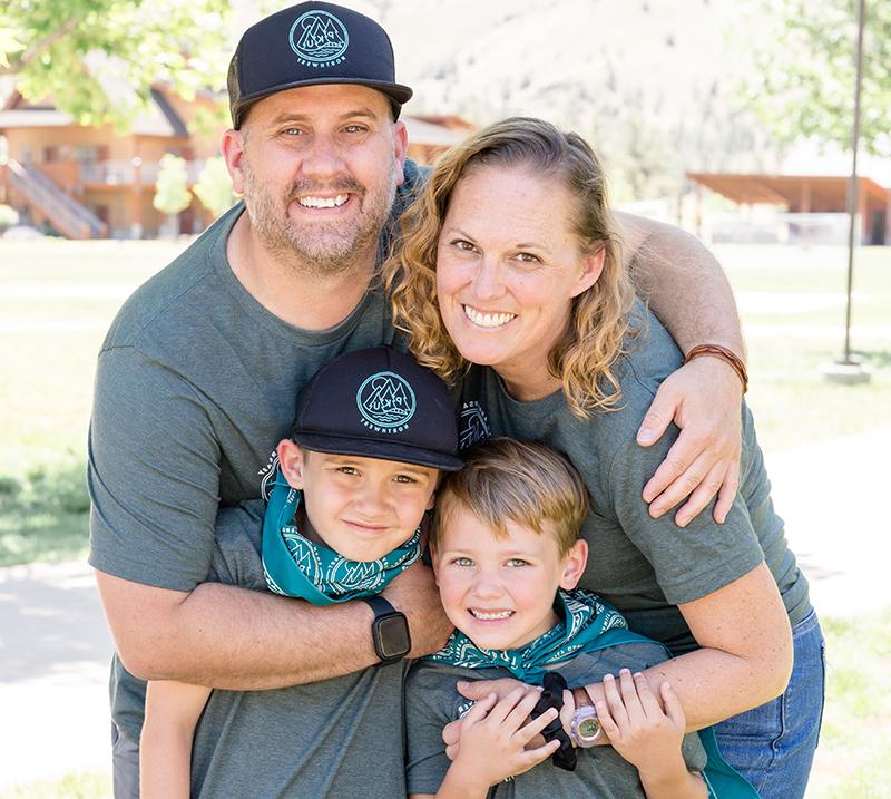 Jen Christenson with her husband Blaine and sons Emery and Owen at flok Family Camp West.